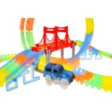 JOKO Fluor Svietiaca Autodráha s Mostom Variabilná 157ks 298m + auto s LED svetlom na batérie