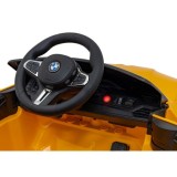 JOKO Elektrické autíčko BMW M4, penové kolesá, kožené sedadlo, žlté